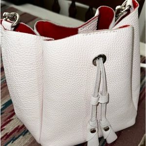 White Bucket Crossbody bag with red inside
